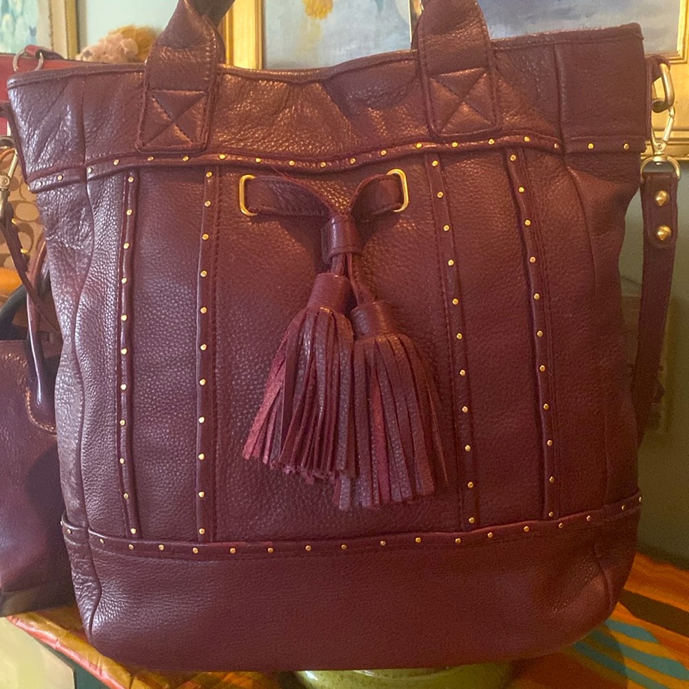Steve Madden Cranberry Shoulder Tote with Gold Stud Accents.